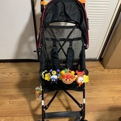 バギータイプベビーカー・おもちゃ、レインカバー付きの画像