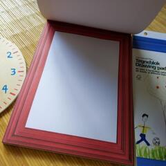 知育 時計と 額風お絵描き帳の画像