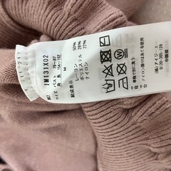 axes femme ピンクセーターの画像