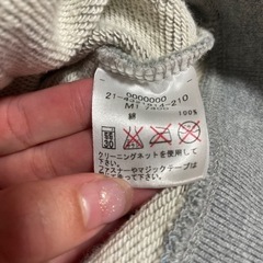TOMMY フード付きパーカーの画像