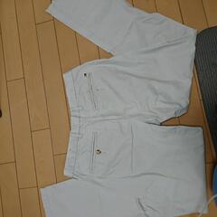 トミーヒルフィガー のチノパンの画像