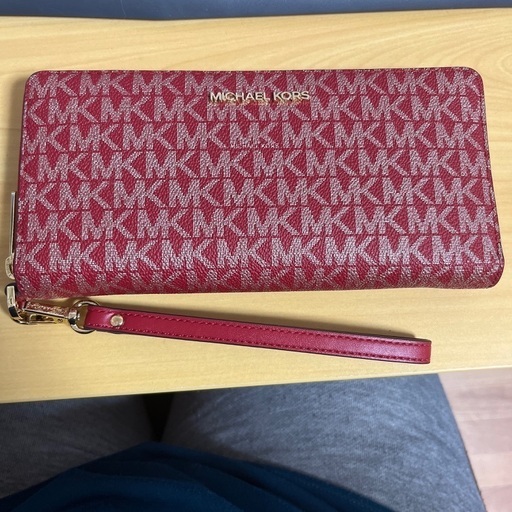 赤色マイケルコース長財布