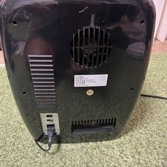 ミニ冷蔵庫、温めることもできますの画像