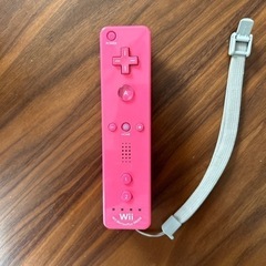 Wiiのコントローラーとマリオハンドルの画像