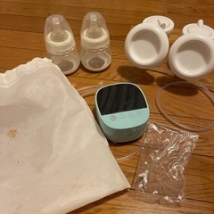 自動搾乳器