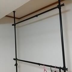 服かける棒の画像