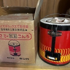 練炭コンロと練炭の画像