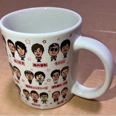 吉本芸人のイラストがプリントされたマグカップ