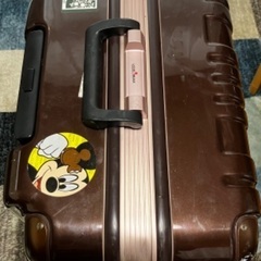ブラウン スーツケース(タイヤゴム1ヶ所無し)の画像