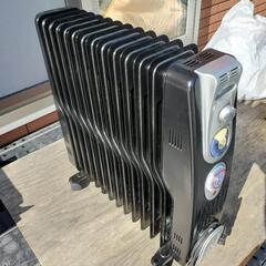 旧式オイルヒーター最大1400Wの画像