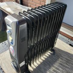 旧式オイルヒーター最大1400Wの画像