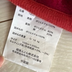 ハンガーと冬用シーツの画像