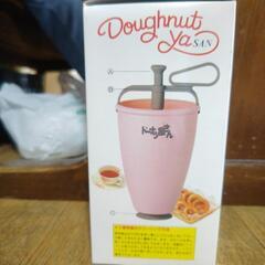 ドーナツの型と、仮面ライダーのお弁当箱の画像