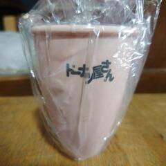 ドーナツの型と、仮面ライダーのお弁当箱の画像