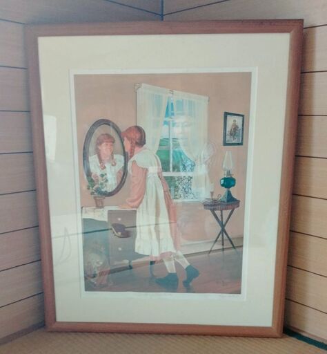 レストランで飾られた絵画「鏡を見る少女」額縁付き