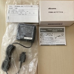 ガラケーdocomo未使用品 FOMA ACアダプタ02の画像