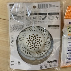 排水口キャッチ4つと水道ろ過蛇口の画像