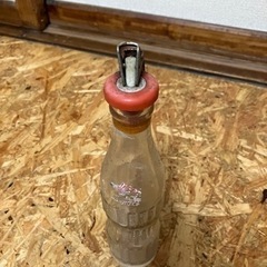 栓抜きキャップ付き空瓶の画像