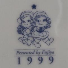 ペコちゃんポコちゃんの限定品プレートの画像