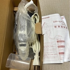 アイロン台と新品スチームアイロンの画像