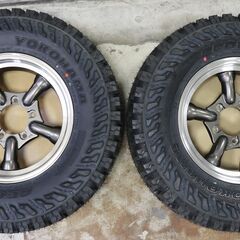 新品・未使用品【タイヤ ホイール 4本セット】ジムニー・ジムニーシエラに如何ですか。アルミホイール⇒モーターファーム J-TRADガンメタリック（DCリム）16×5.5J/5H -25（マイナス25）、タイヤ⇒ヨコハマ ジオランダー M/T G003 LT245/75R16の画像