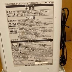 古い石油ストーブ2台とポリタンク3個の画像