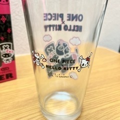 「ワンピース×ハローキティ」のグラス(飛行機柄)の画像