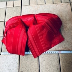 赤い帯の画像
