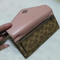 COACHシグネチャー長財布の画像