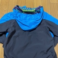 100／ウィンドブレーカー青色チャコール裏地総柄フード付の画像