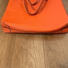 肩がけトートバッグオレンジリバーシブルの画像