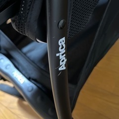Aprica アップリカ ベビーカー　ラクーナビッテクッション レインカバー付きの画像