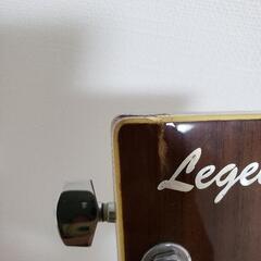 アコースティックギター　スタンド付きの画像