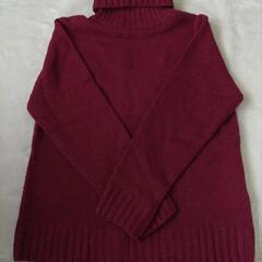 赤のニット