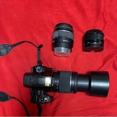 sony a55 camera with 3 lens の画像