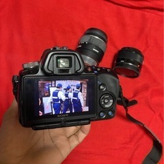 sony a55 camera with 3 lens の画像