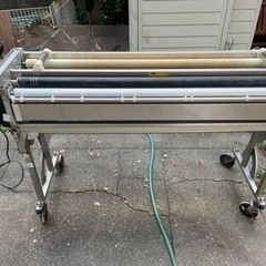 クロス糊付け機