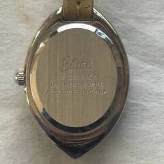 差し上げます。中古Junk品 ○ 黄色い皮に包まれた3針アナログ時計 Elite○の画像