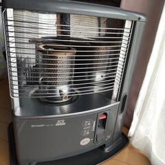 お話し中  石油ストーブ(ジャンク品)の画像