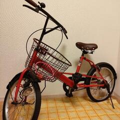 赤の自転車　ピンクのワイヤーロック付き