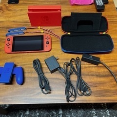 Nintendo Switch (おまけ付き)限定カラー マリオレッド×ブルーの画像