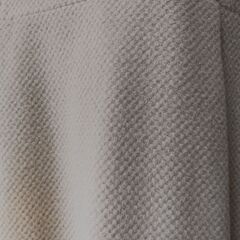 ガーリーなオフホワイトコートの画像