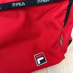 大きな旅行バック　赤　フィラFILA の画像