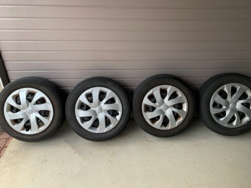 DUNLOPノーマルタイヤ トヨタ純正ホイールキャップ付 4本セット