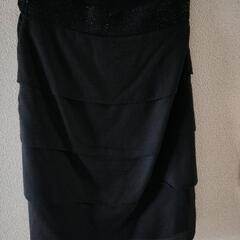  UNTITLED スカート　オフィス　普段着の画像