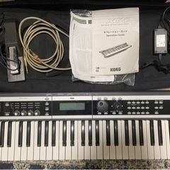 KORG X50 キーボード ケースやペダル等の付属品付きの画像
