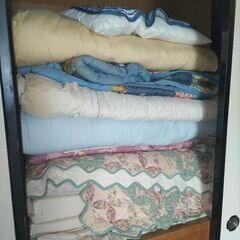 お布団を差し上げます。の画像