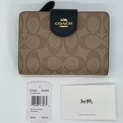 大幅値下げ‼️✴️新品未使用✴️COACH 二つ折り財布 シグネチャー柄 C0082の画像