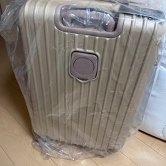 キャリーケース　ベージュ　ピンクの画像