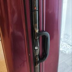 Porte Blanche　大型キャリーケース　タイヤゴム破損の画像